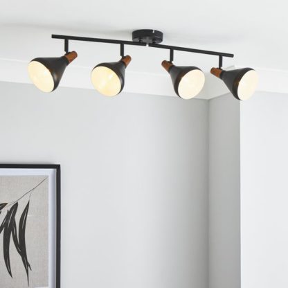b809df47c4b796d8885a5b07f4507c264d9a8b3777cfef812875d0ff84bdb267.jpg An Image of Elements Wolston 4 Light Semi Flush Spotlight Bar