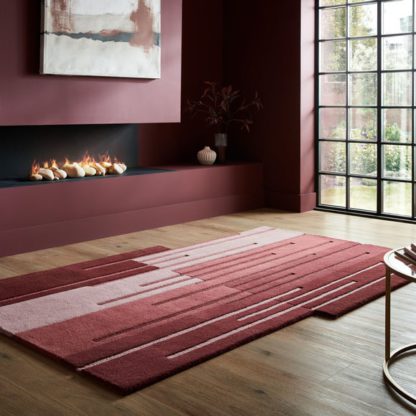 c1e3e1969be5ea2032ea8eb9c0042b0dc2a059412f7add46cadec3959aca88fa.jpg An Image of Split Ombre Shaped Wool Rug