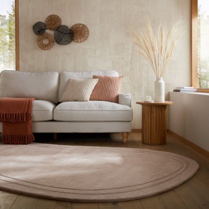 cb0ca770dcae7803d8e232442ea57673e0e41f17abed3e9b75e897eed689cc2b.jpg An Image of Curve Wool Pebble Rug
