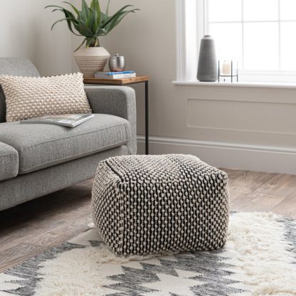 d16301e6c72fc3ece33a83cad8c38d7b170a2638801b5d850797e96f314cbc0e.jpg An Image of Jersey Bobble Pouffe