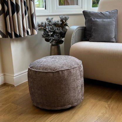 d41a01925424bf88ed7e0da8a1f5c0b2eb55838826d6052df0c8c9f61e15ab02.jpg An Image of Daro Waffle Round Pouffe