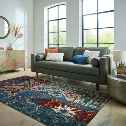 dd4e267b77db3c39ba9f2d34e39486561037ef468ea9f5a14c04c6447ee6672a.jpg An Image of Traditional Patchwork Rug