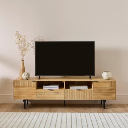 e9ec3cac5e1a10217c98bf922ac380223fa7b4e648f9cd8f209bc95bf74967d8.jpg An Image of Spencer Extra Wide TV Unit for TVs up to 80", Mango Wood