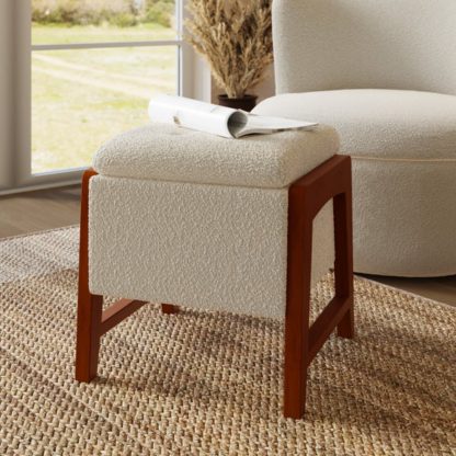 ec0a5db6bfabcd3dd9bf9c5fd38b6c4070e2b1eebfd80b740e7b8457d823d449.jpg An Image of Annie Boucle Footstool