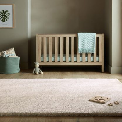 ec63bacad3577b51c9e112764e9065ab827963f9a7b4562d120f2ae737c84bf2.jpg An Image of Faroe Wool Look Washable Faux Fur Rug