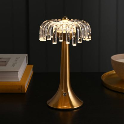 f4fcdb81016a2782da83dbf987da17ae9c58c848c3461b4bb46de9d89a26badc.jpg An Image of Hestia Bronze Base Crystal Trim Rechargeable Colour Changing LED Touch Table Lamp