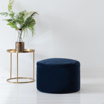 f6b6d25adcb7e896f0e2cc91704bee04ce14e999583bbad26a478438c2abc6d4.jpg An Image of Eliza Velvet Pouffe